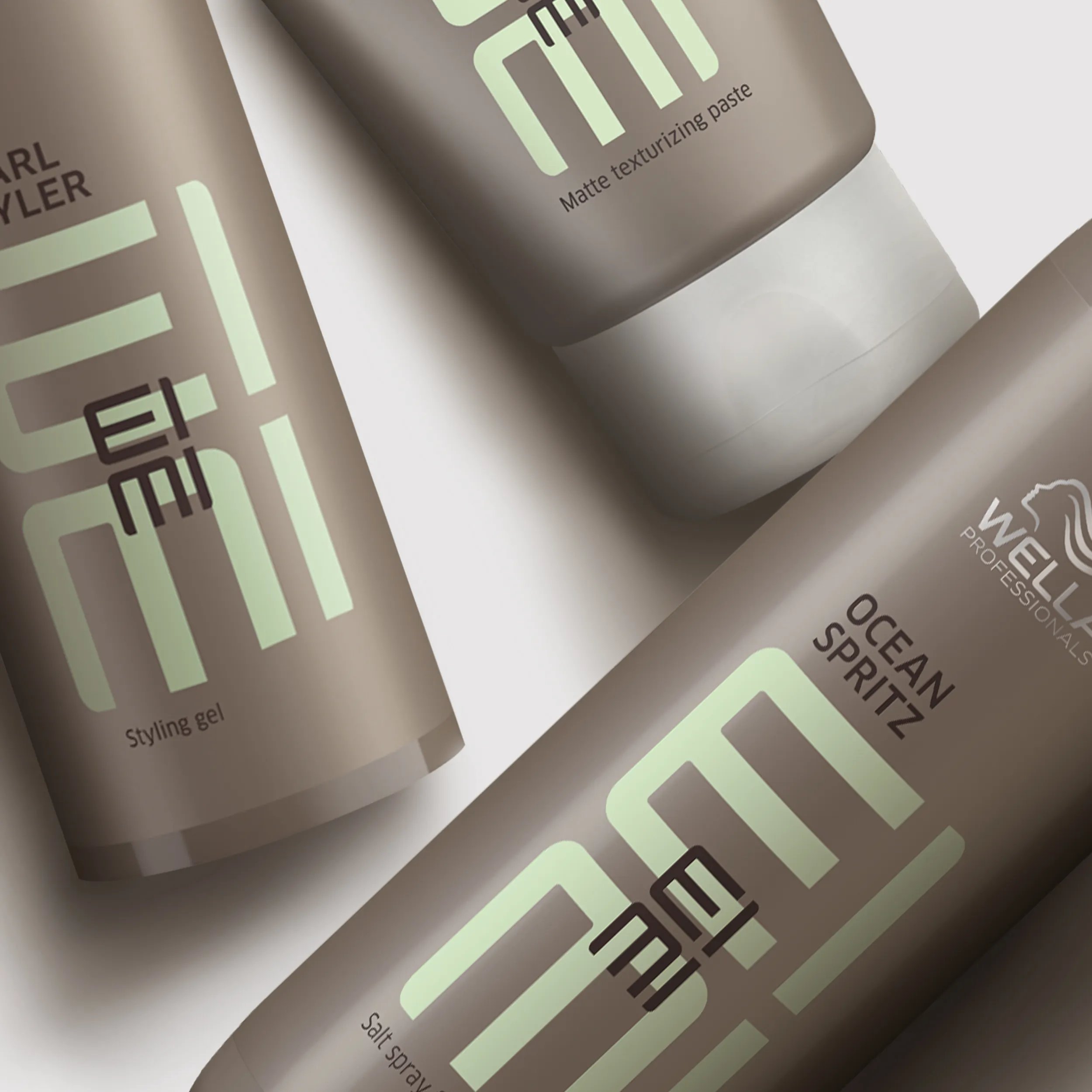 Wella EIMI Sculpt forcestyling gel packshot - a  tub with a white lid and mint green EIMI logo.