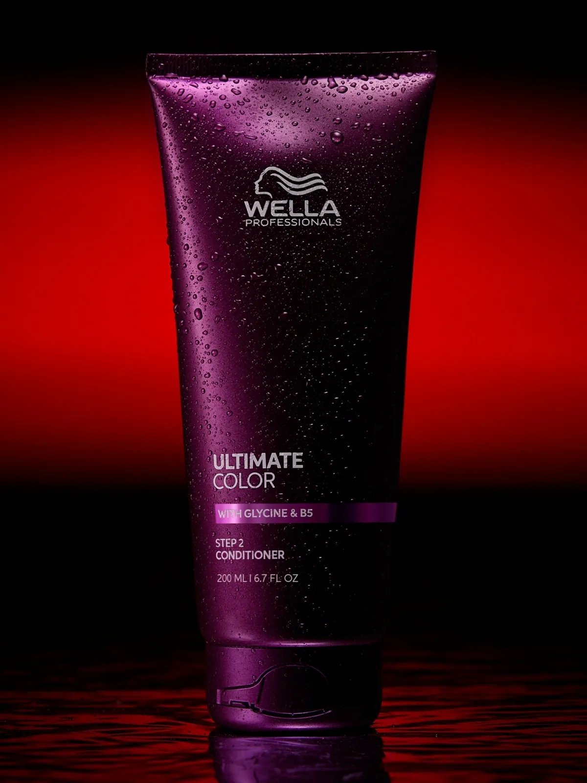 ULTIMATE COLOR Conditioner on a red background. 