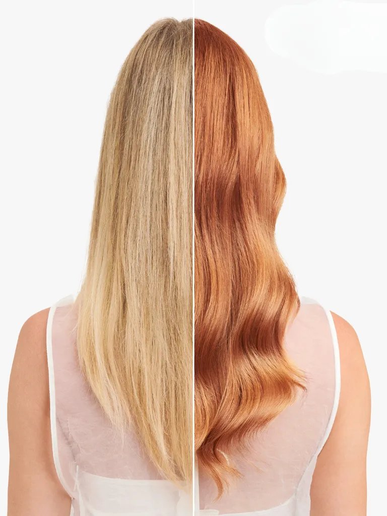 Before and after showing model’s blonde hair transformed into a strawberry blonde shade with Illumina Color.