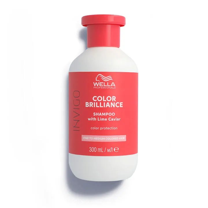 Packshot of Wella Professionals Invigo Brilliance Vibrant Color Shampoo for fine/normal hair - a red bottle with white font and a darker red Wella logo.