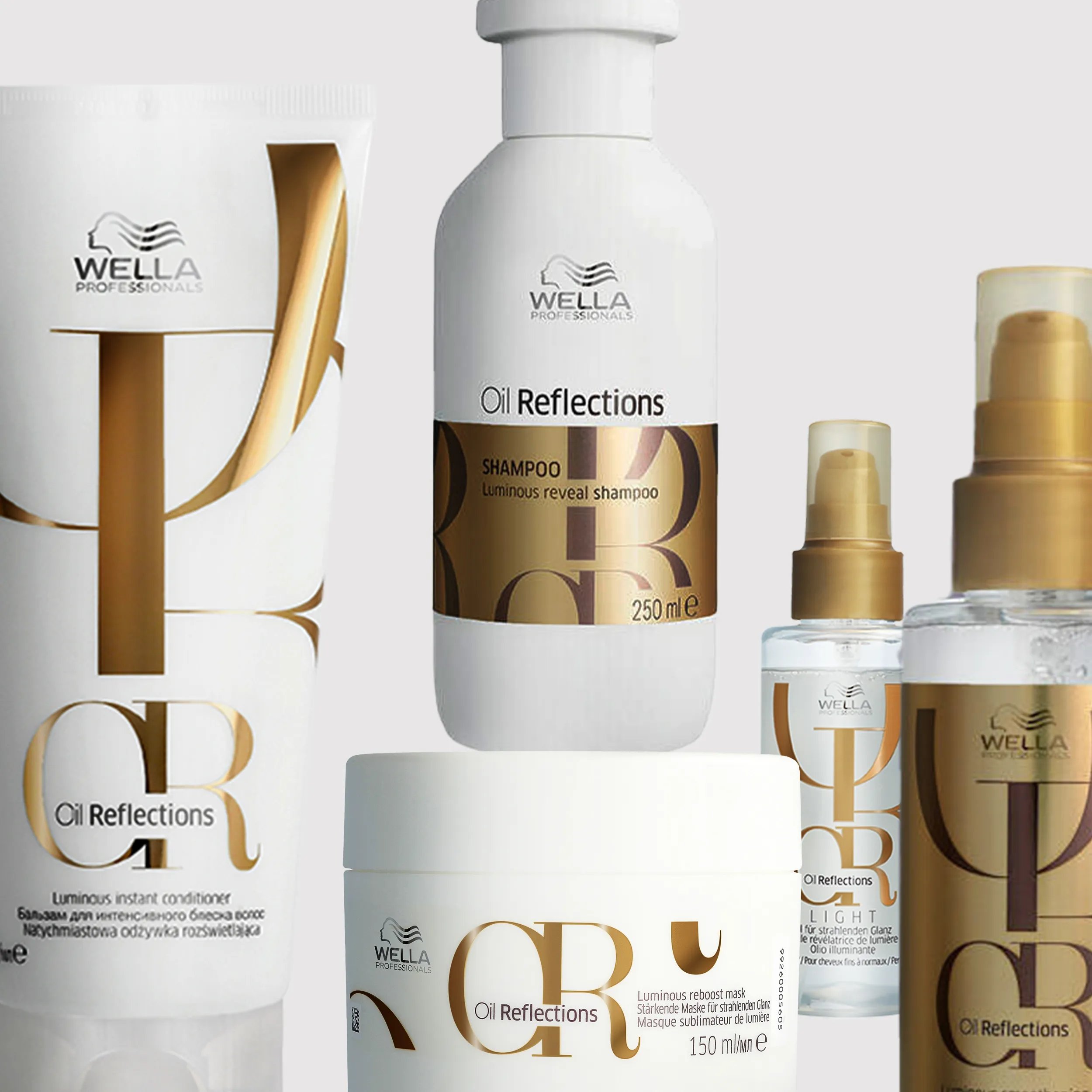 Wella Oil Reflections shampoo, conditioner, hair oil, and smoothing oil product shot.