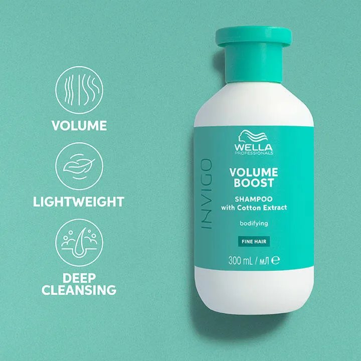 Image of a teal Wella Professionals Invigo Volume Boost Bodifying Shampoo bottle, highlighting its volume, lightweight, and deep cleansing benefits.