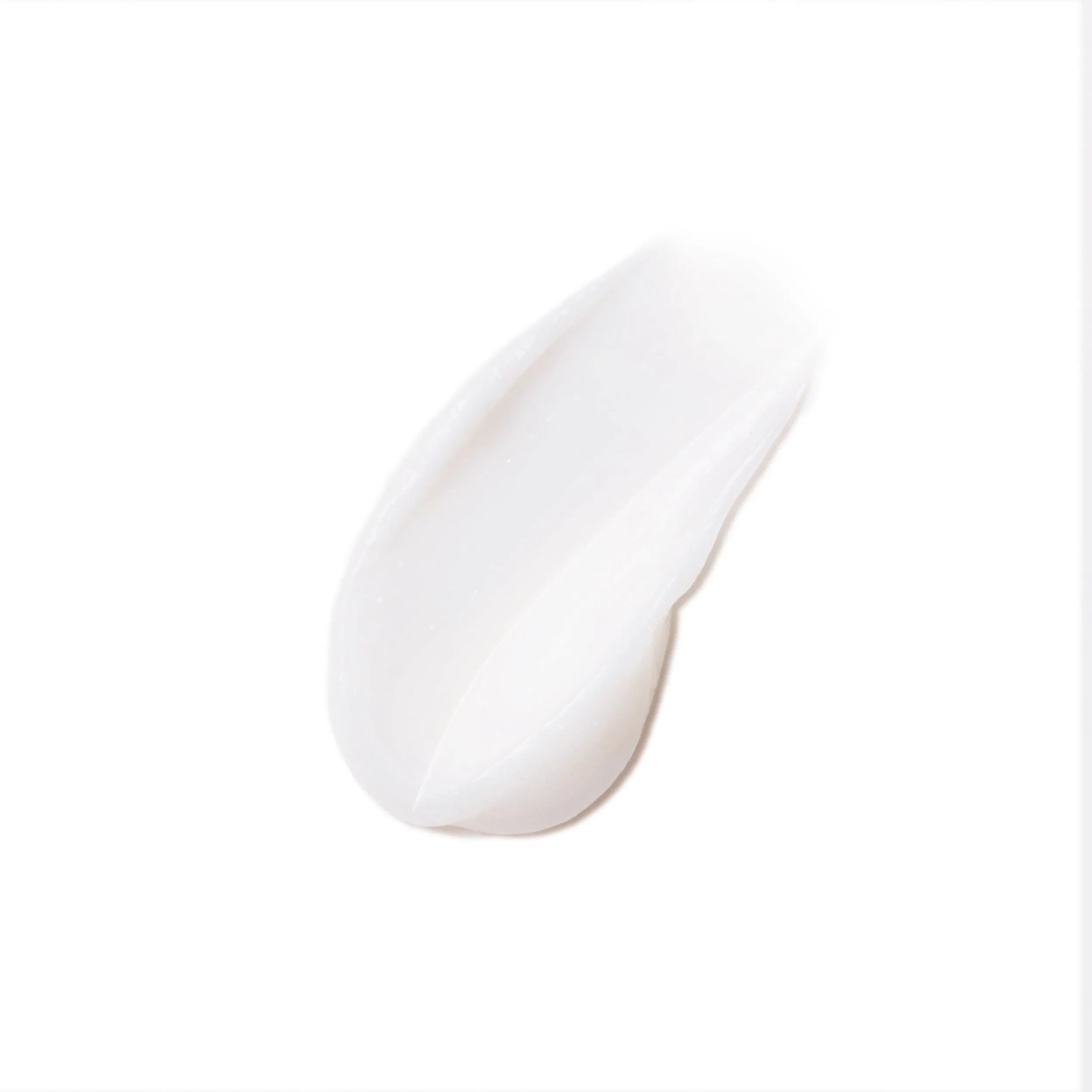 Photographie en gros plan d’un blob circulaire du masque régénérateur Elements sur fond blanc.