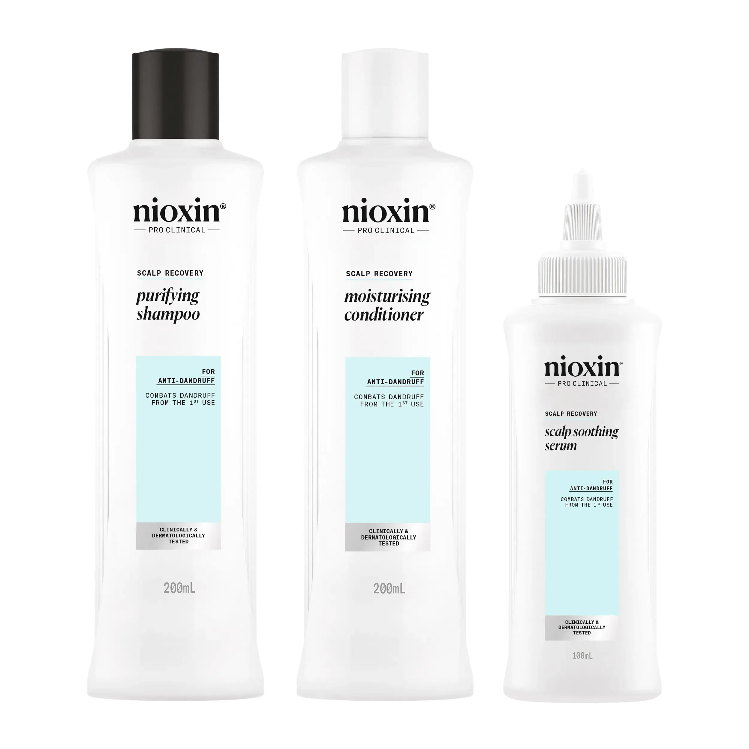 nioxin shampoo, conditioner and scalp soothing serum bottles against baby blue background