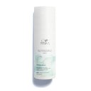 White bottle of Wella Professionals NutriCurls Curlixir Balm.