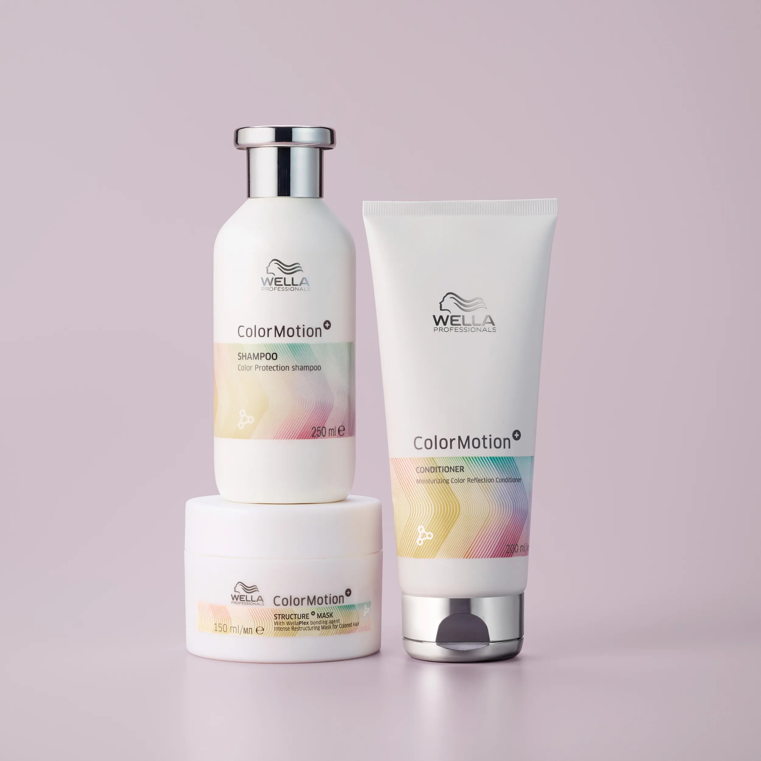 Wella Professionals ColorMotion+ products - conditioner, shampoo & structure mask - photographed on a bathroom shelf.