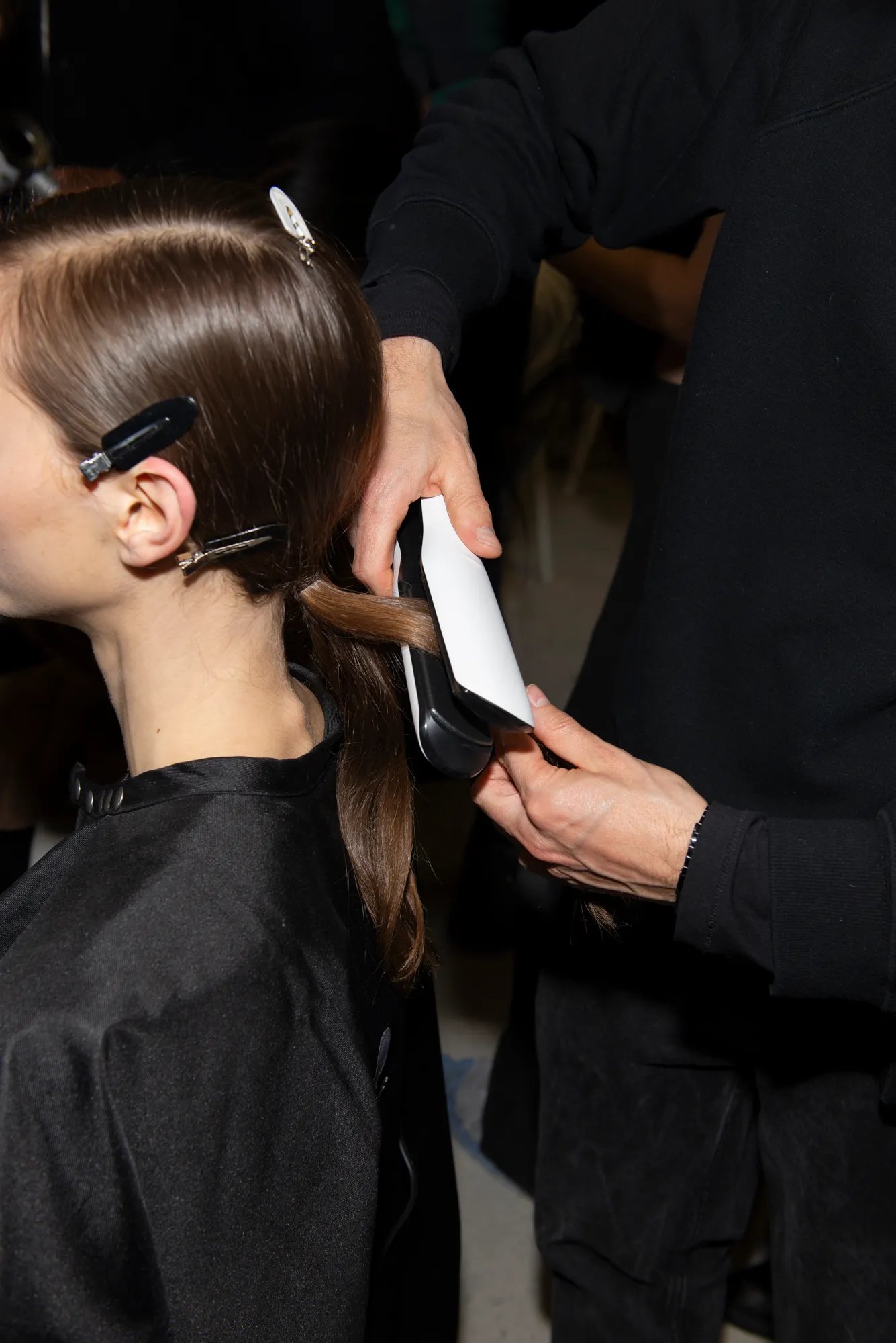 Model’s hair is styled with ghd chronos max.