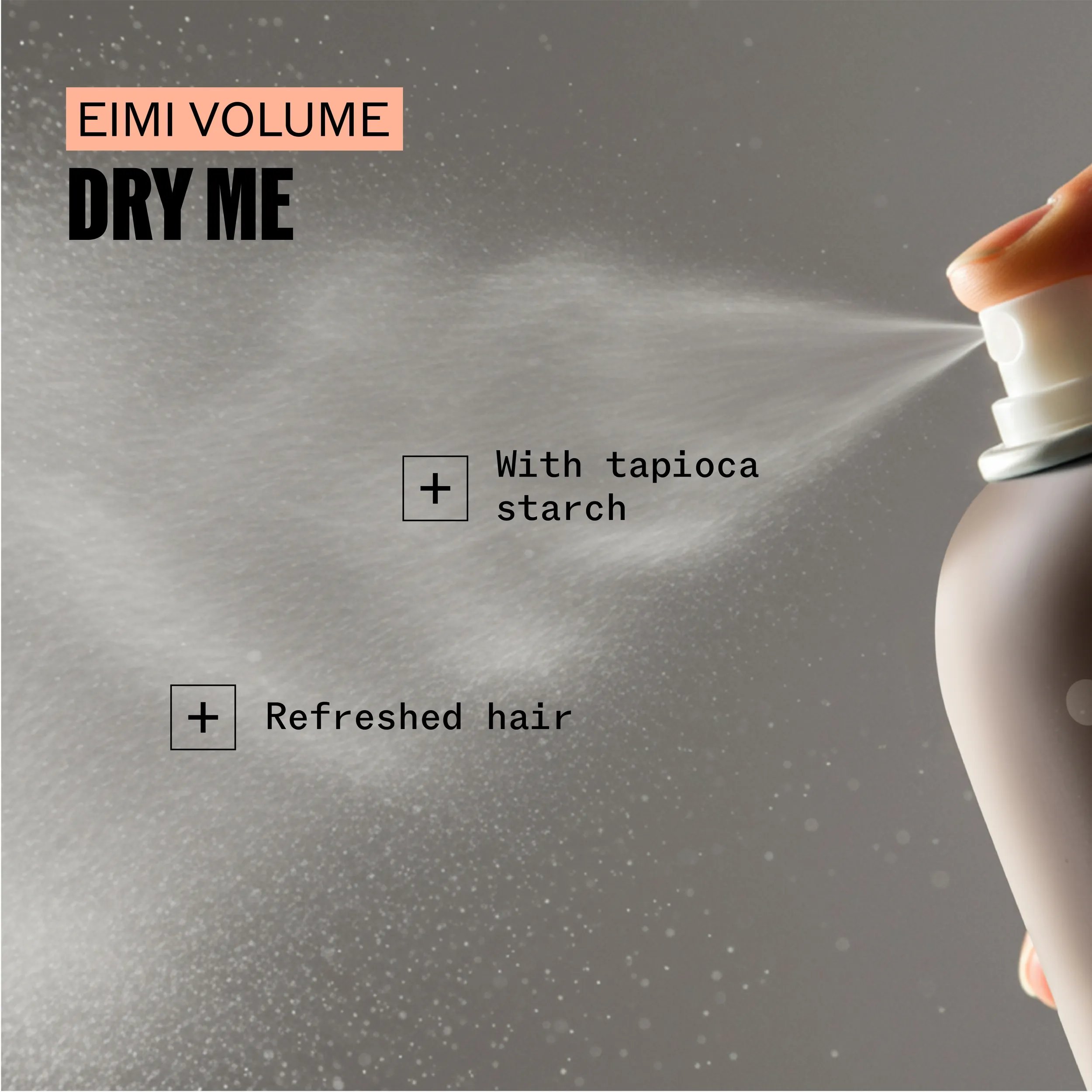 Close-up of an aerosol can of Wella EIMI Dry Me being sprayed.
