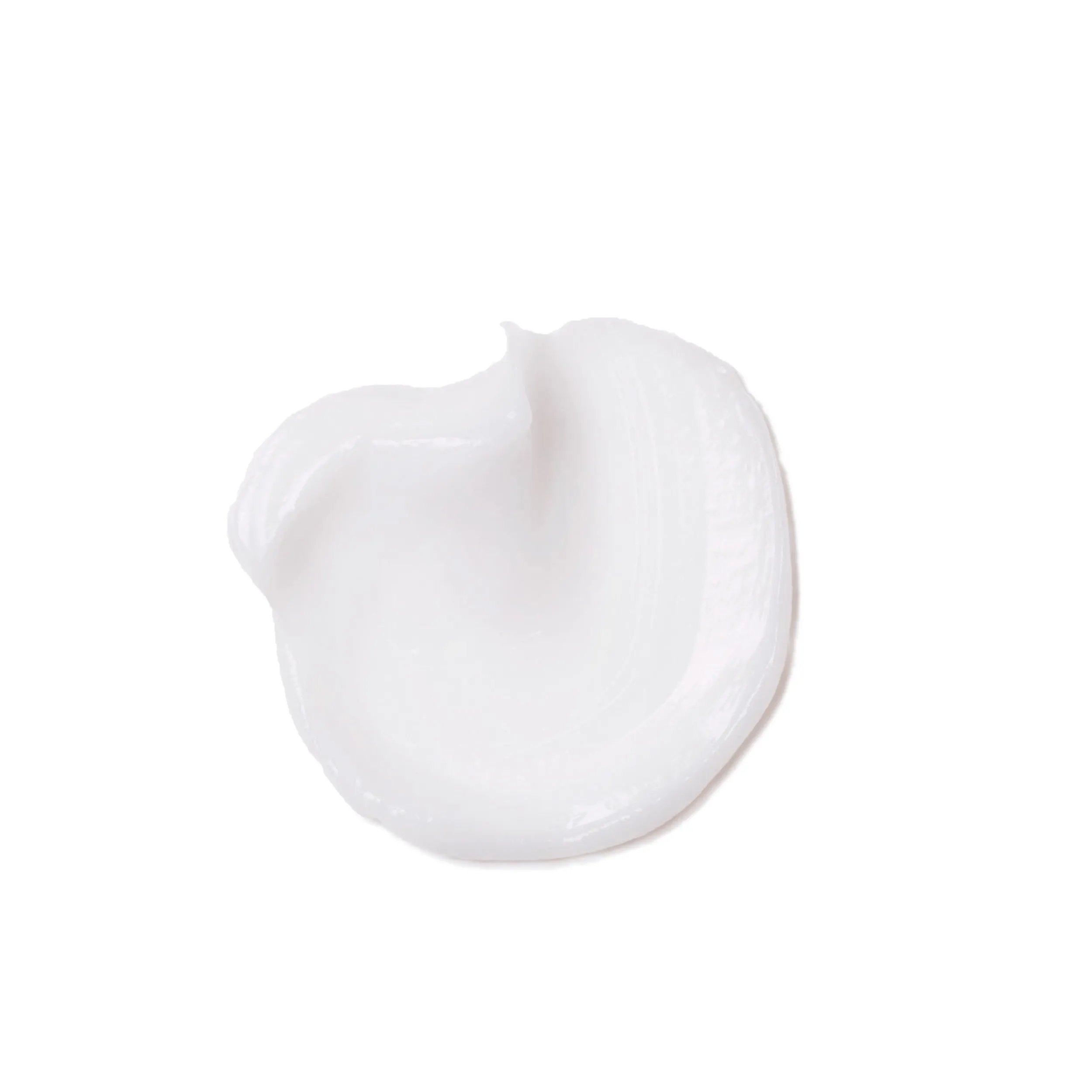 Photographie en gros plan d'une tache circulaire du produit Fusion Intense Repair Mask sur un fond blanc.
