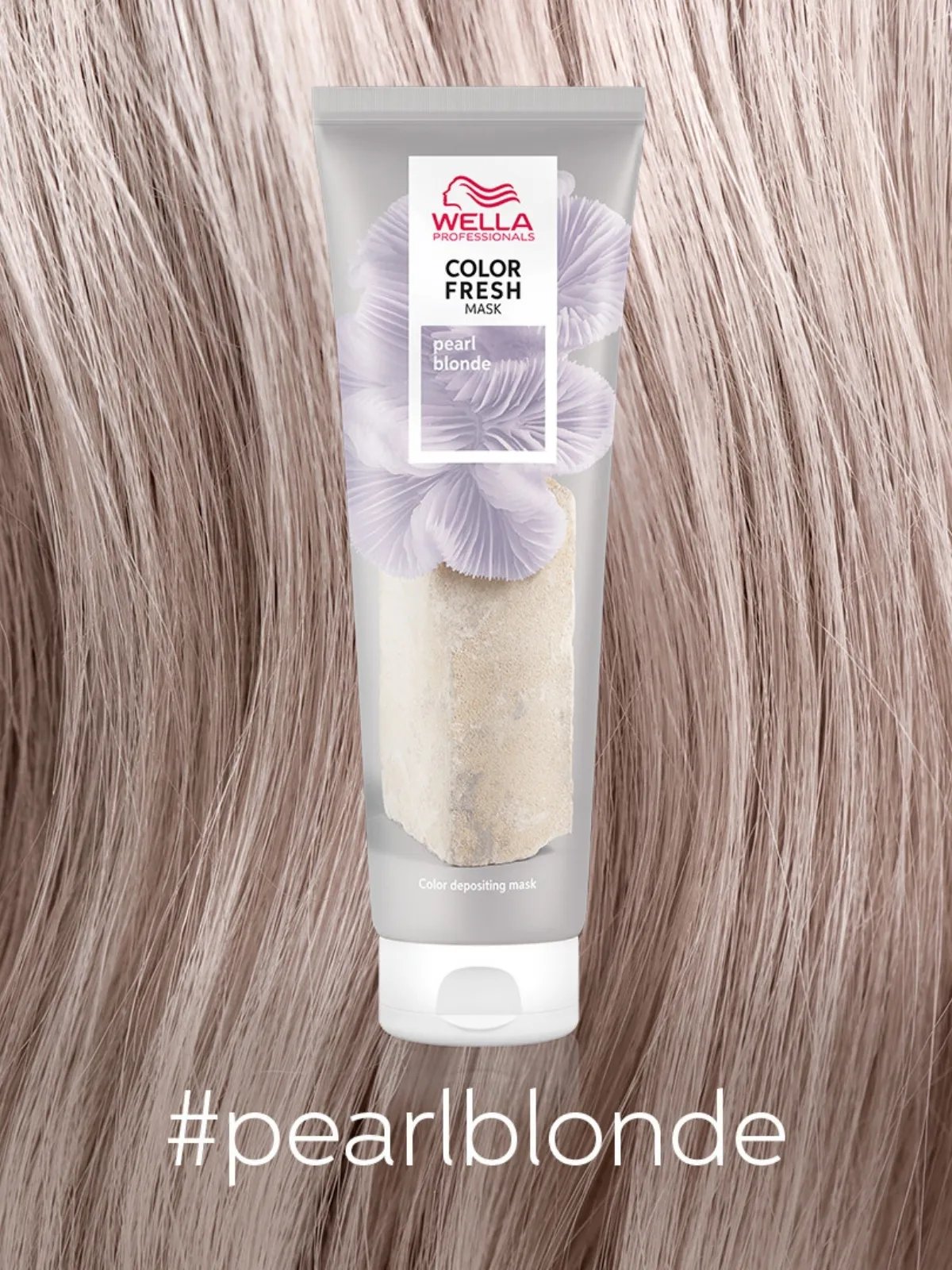 Model with long, loosely waved, golden butter blonde hair.