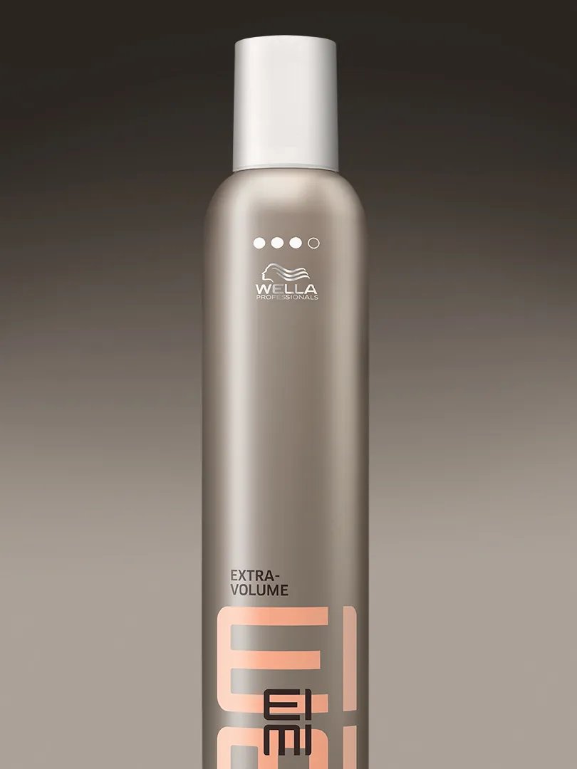 Close-up of white styling mousse