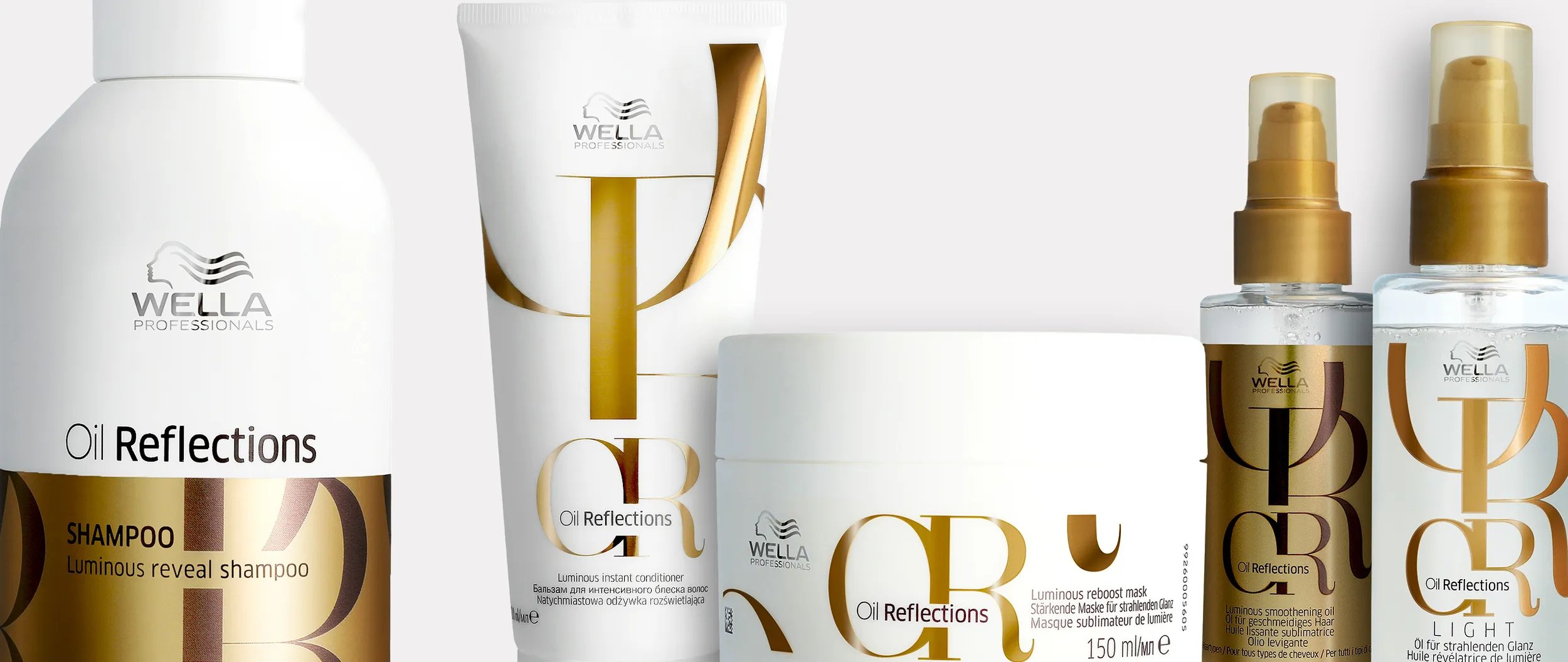 Wella Oil Reflections shampoo, conditioner, hair oil, and smoothing oil product shot.