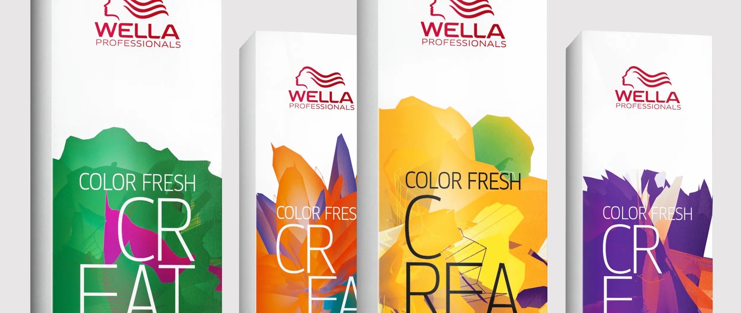 Four Wella Color Fresh hair color boxes in green, orange, yellow, and purple color schemes, standing side-by-side.