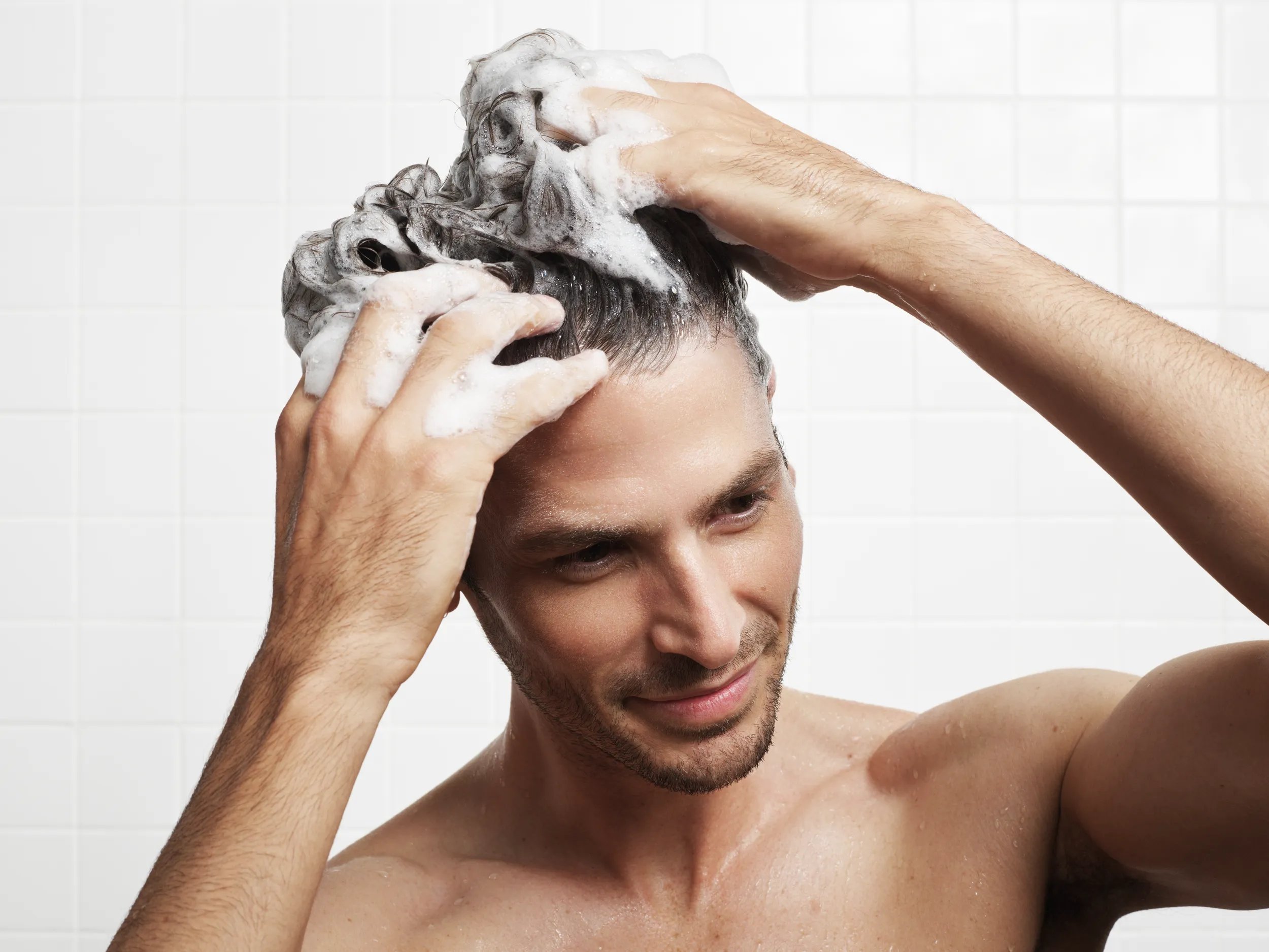 man washing hair