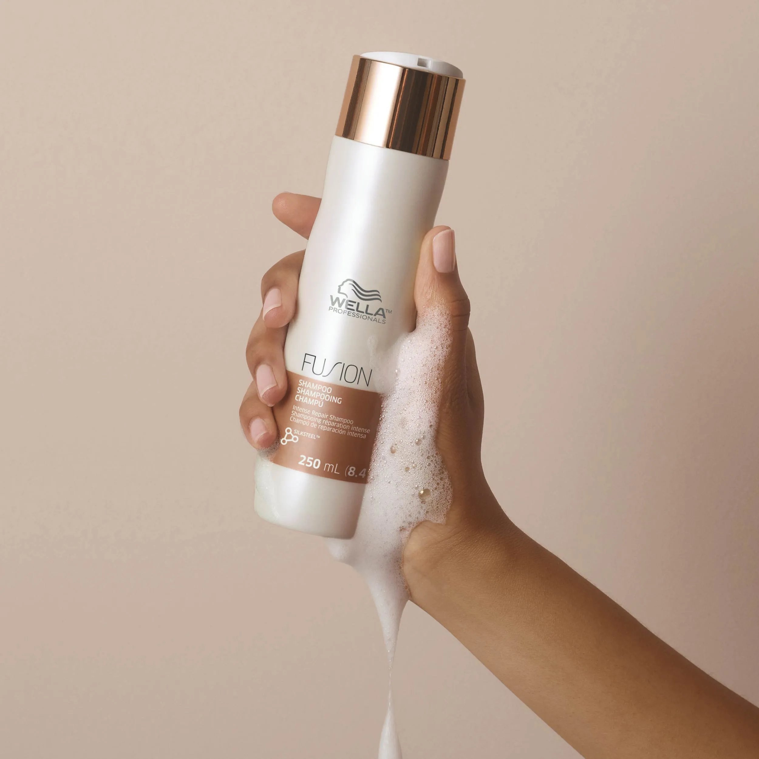 Bottle of Fusion Intense Repair Shampoo.