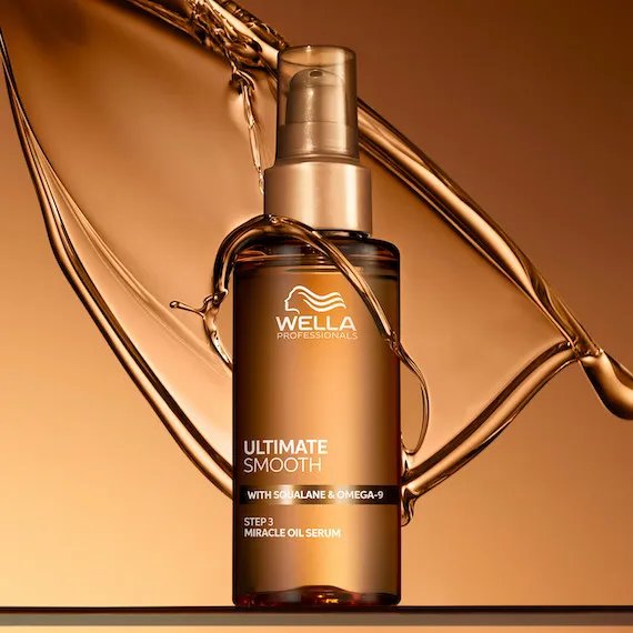 ULTIMATE SMOOTH Miracle Oil Serum on golden background.